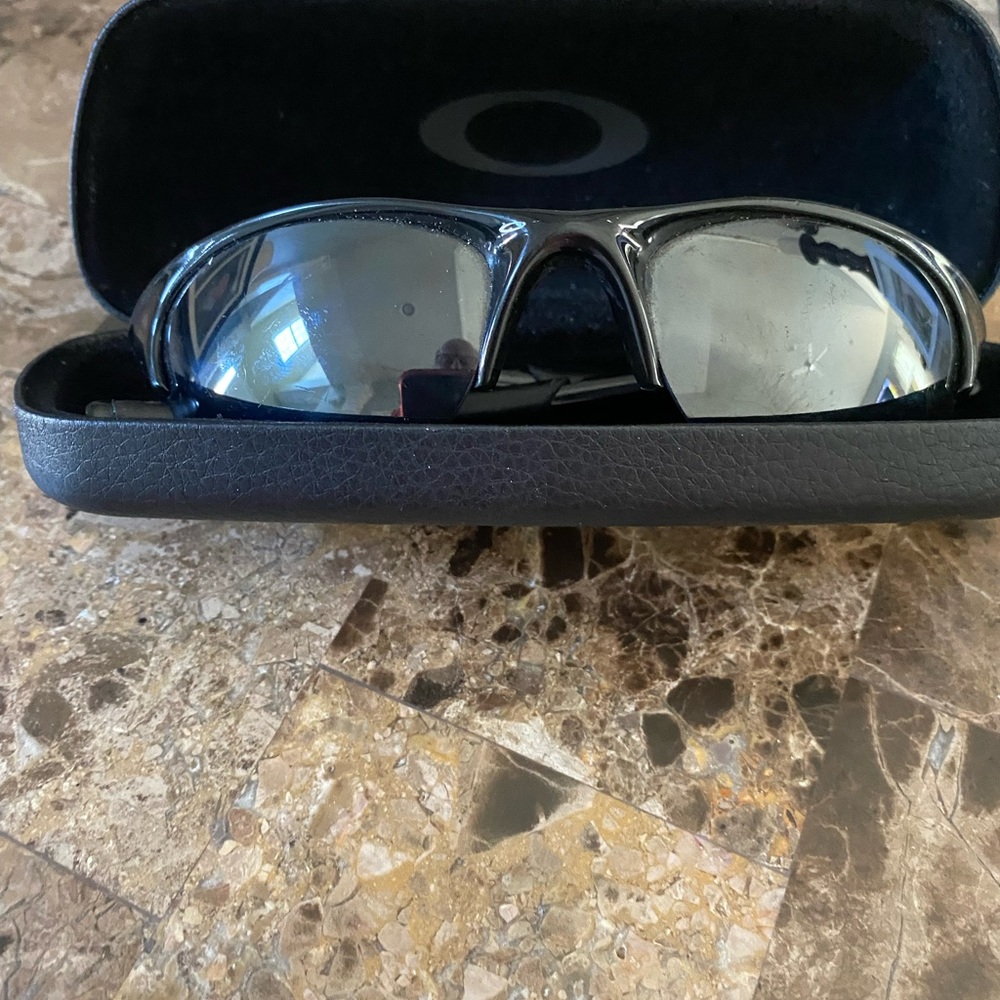 Oakley sunglasses. Good used condition. With case.